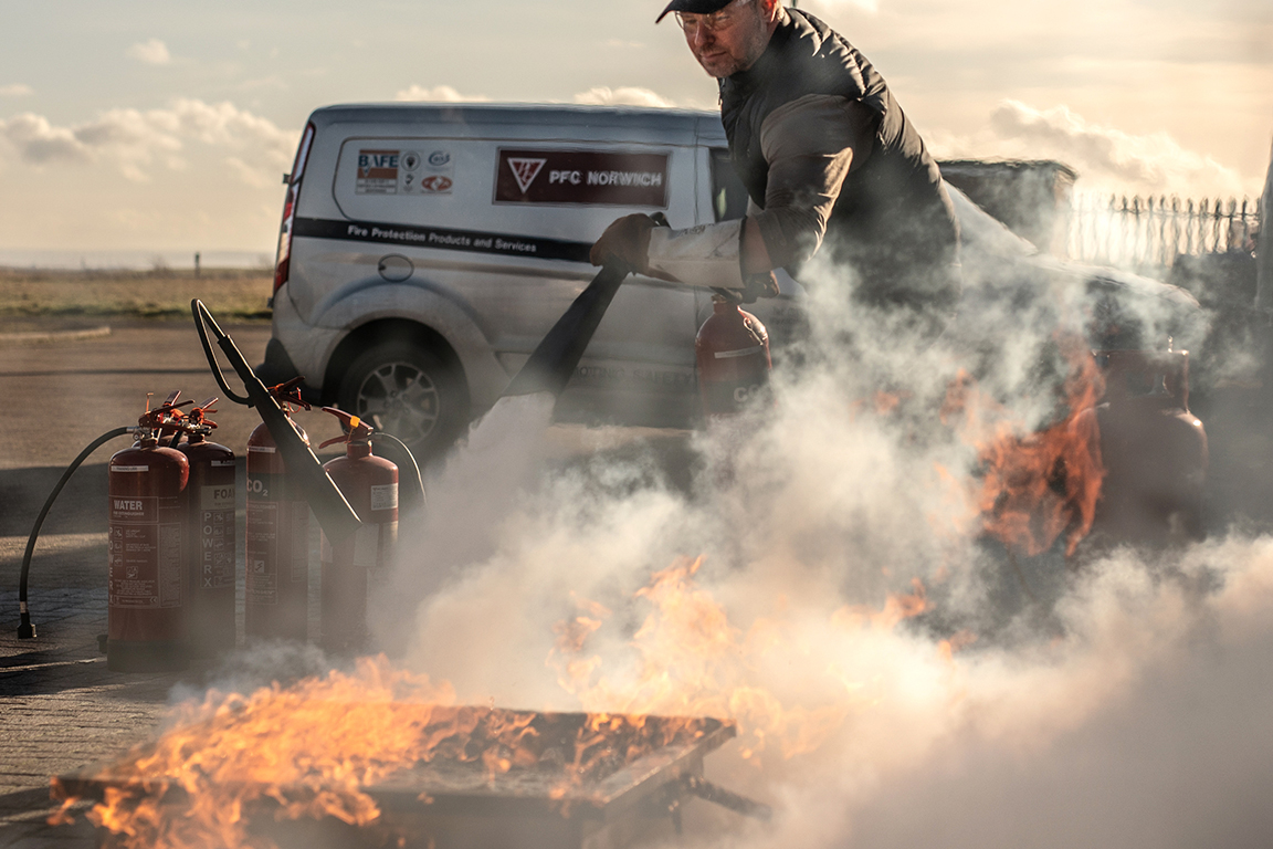 Image of fire being put out by extinguisher